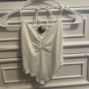 **Buy 4 Get 1 Free.  $5 items only!**.White Halter Top/Crop Top. Worn Once